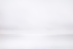 This photograph shows grey water meeting grey horizon on an ocean.