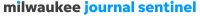 This image shows white and blue text over a white background.